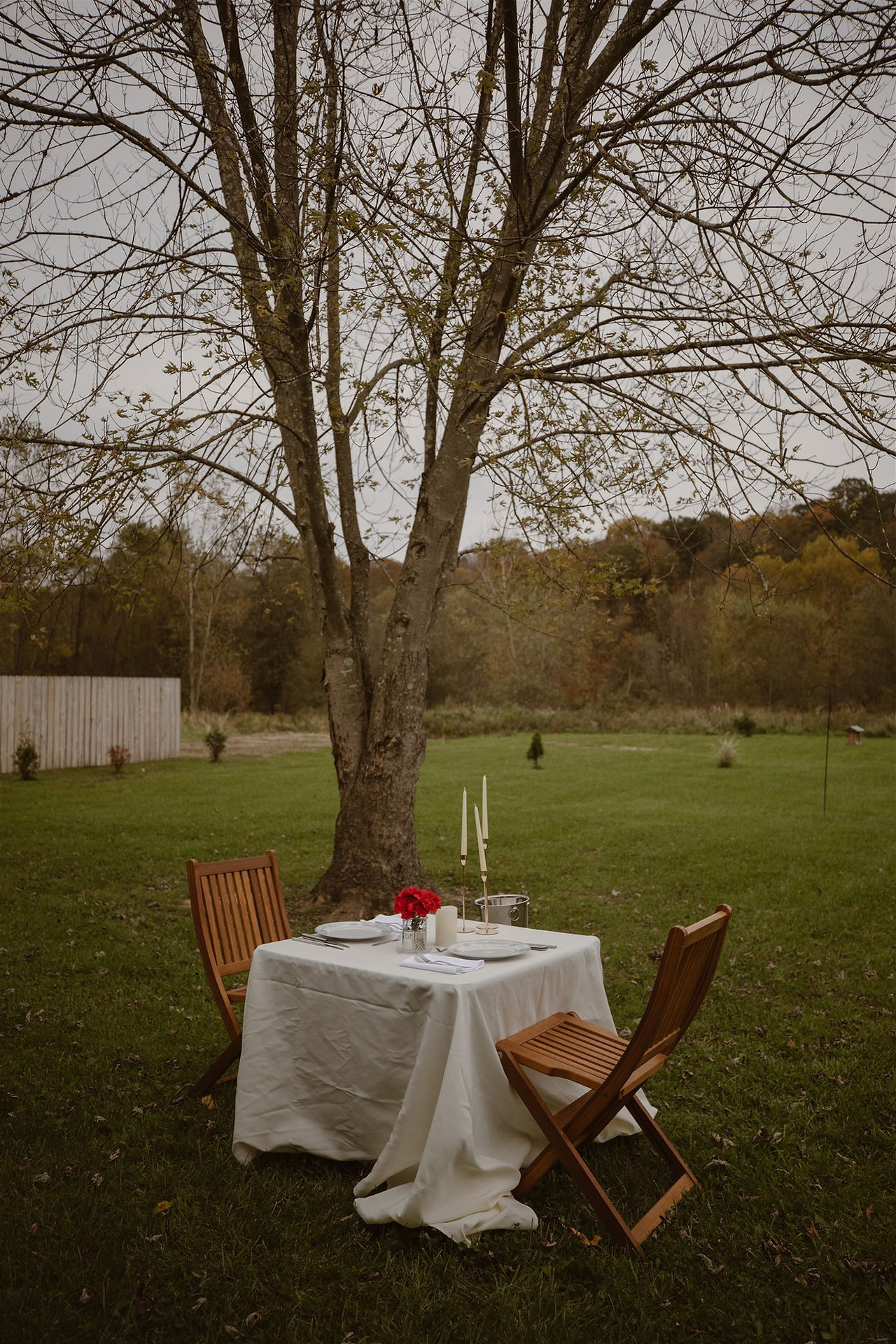 Eloping couple enjoying a private chef catered meal on their hocking hills elopement day