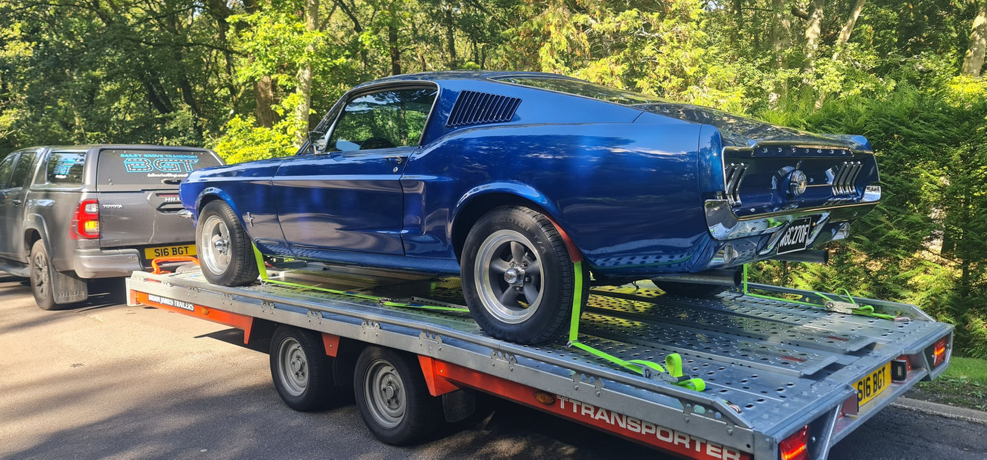 Blue 1967 Ford Mustang Shelby GT500 on transport