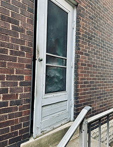 Old Storm door that needed replaced in Pittsburgh neighborhood