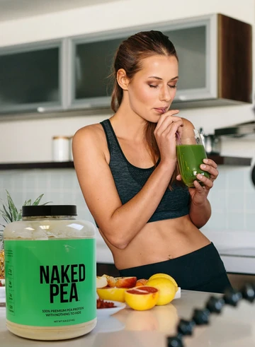 lady enjoying naked nutrition shake