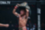 Rodtang holding ONE Championship belt