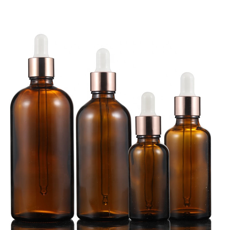 Miniatura: Wholesale brown glass dropper bottles empty with white rubber rose gold lids