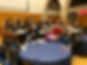 career-networking-mixer-2019-alums-with-career-signs.jpg
