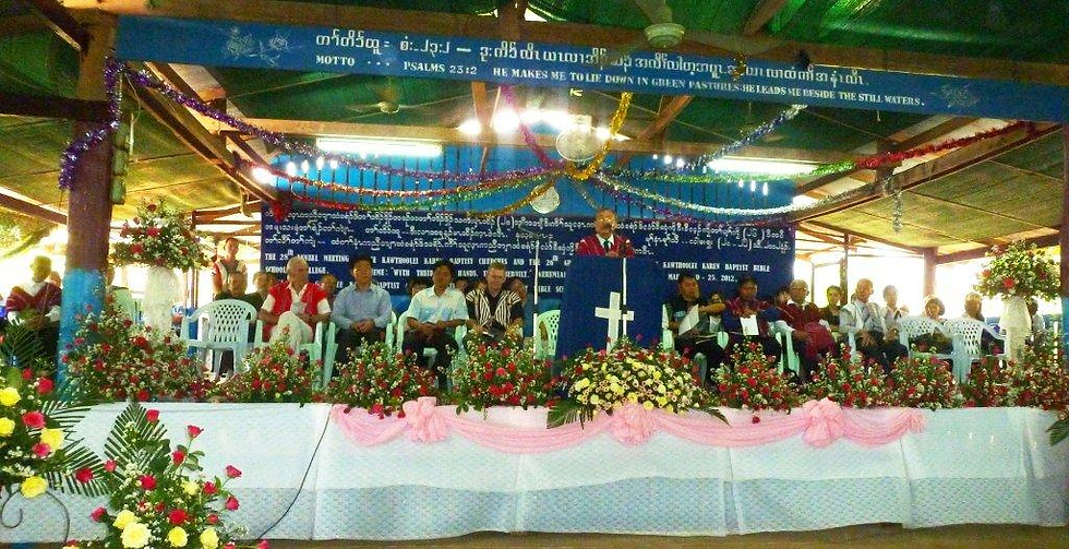 Dr, Simon leading last gradutation before the fire