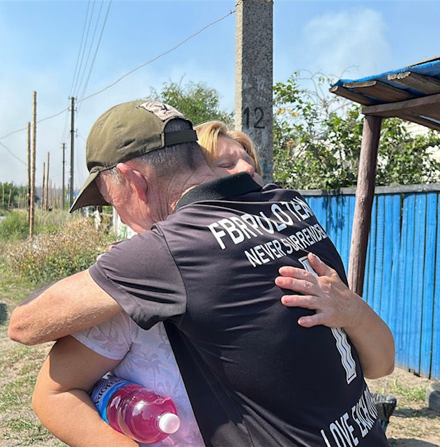 Praying with the woman who did not want to leave.