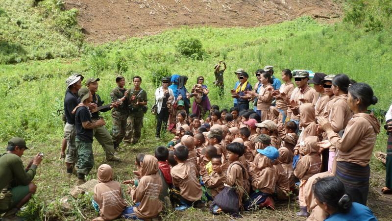 FBR team member singing with villagers in Shan State