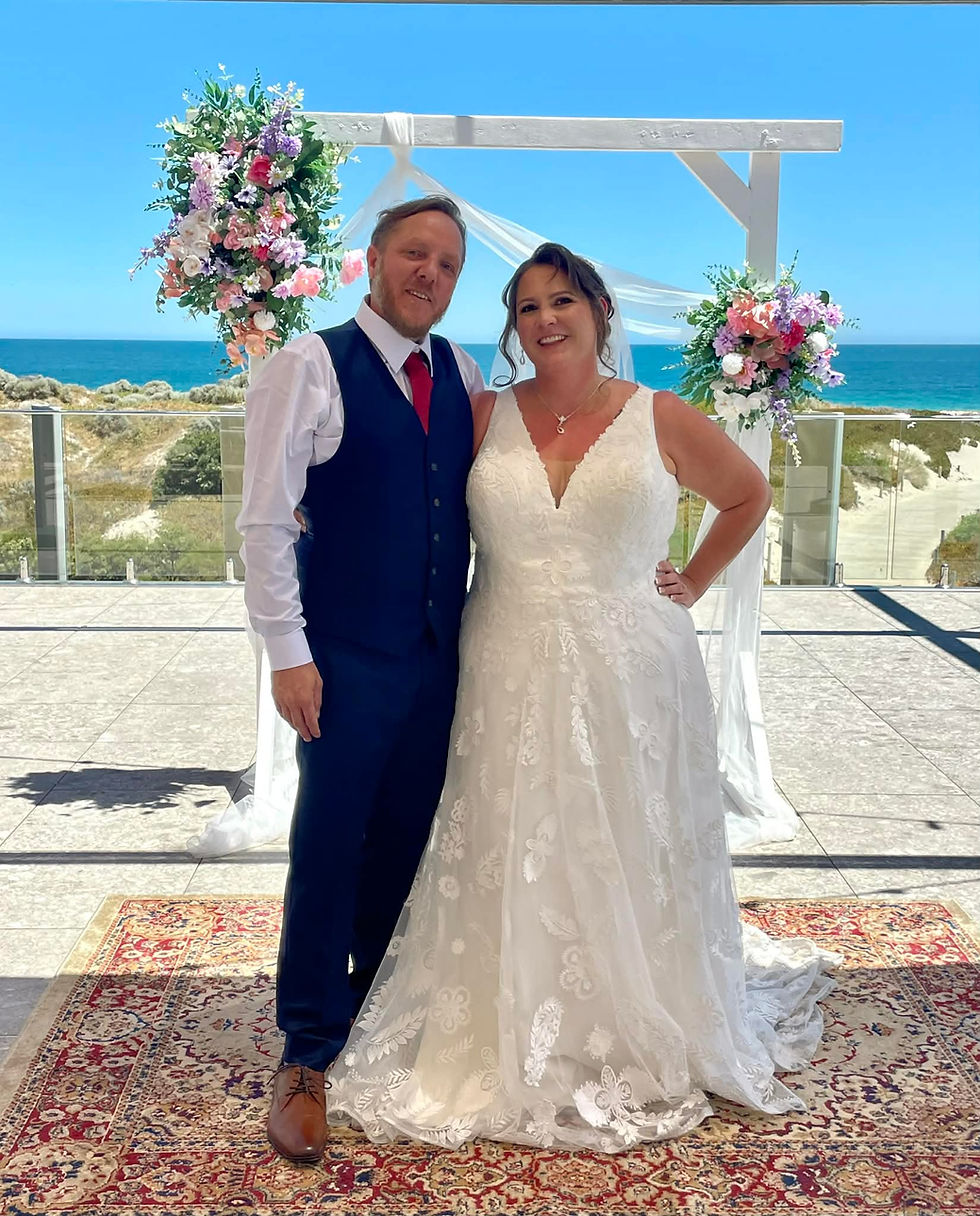 Bride and groom smiling after wedding near beach Perth