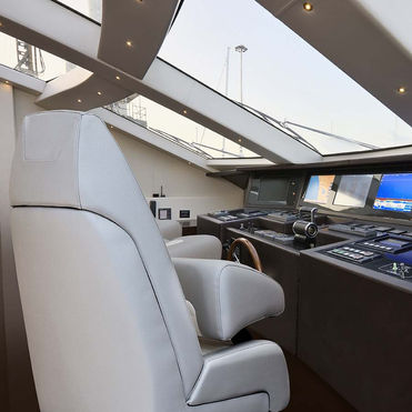 Luxury yacht helm station with Besenzoni helm chair