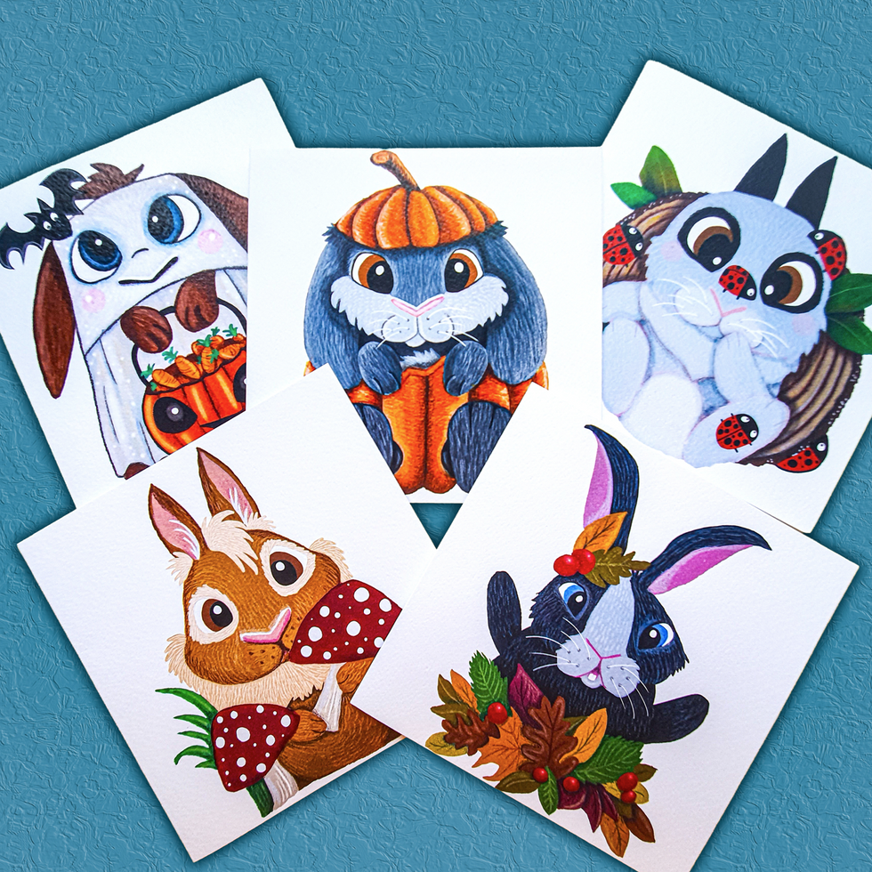 Full set of 5 woodland rabbit cards arranged in autumn display
