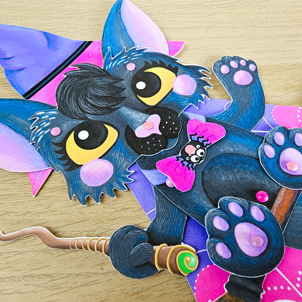 Halloween cat puppet with pointed witch hat and broom