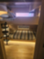 An alternate view of the bunk beds inside the yacht’s interior, showcased on ExplorerYacht.com