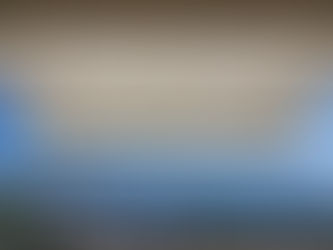 White motorized retractable awning installation for a residential deck in Vancouver, BC.