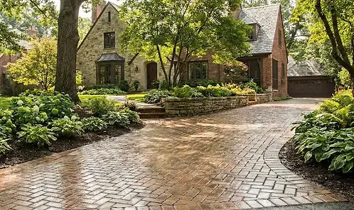 Sloped paver driveway in Glen Ellyn, IL that was cleaned and sealed with a water based, semi-gloss sealant.