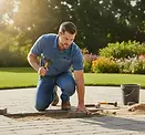 Resetting sunken pavers and making necessary repairs with a rubber mallet and bedding sand