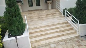 Travertine paver entry steps after professional sealing at a Hinsdale IL home, showing a clean, uniform finish and protected stone surface.