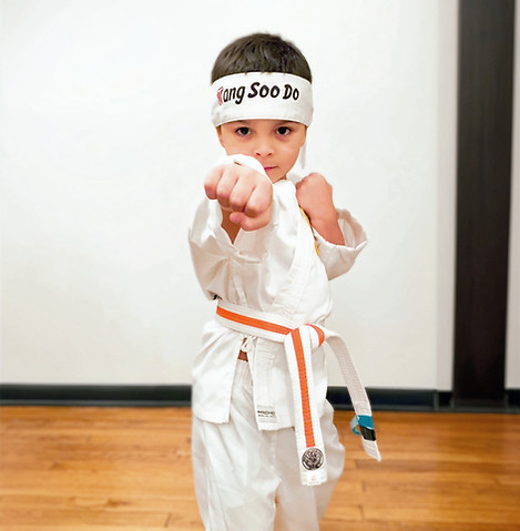 Image of child practicing Tang Soo Do.
