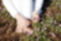 Earthing by having bare feet in the grass