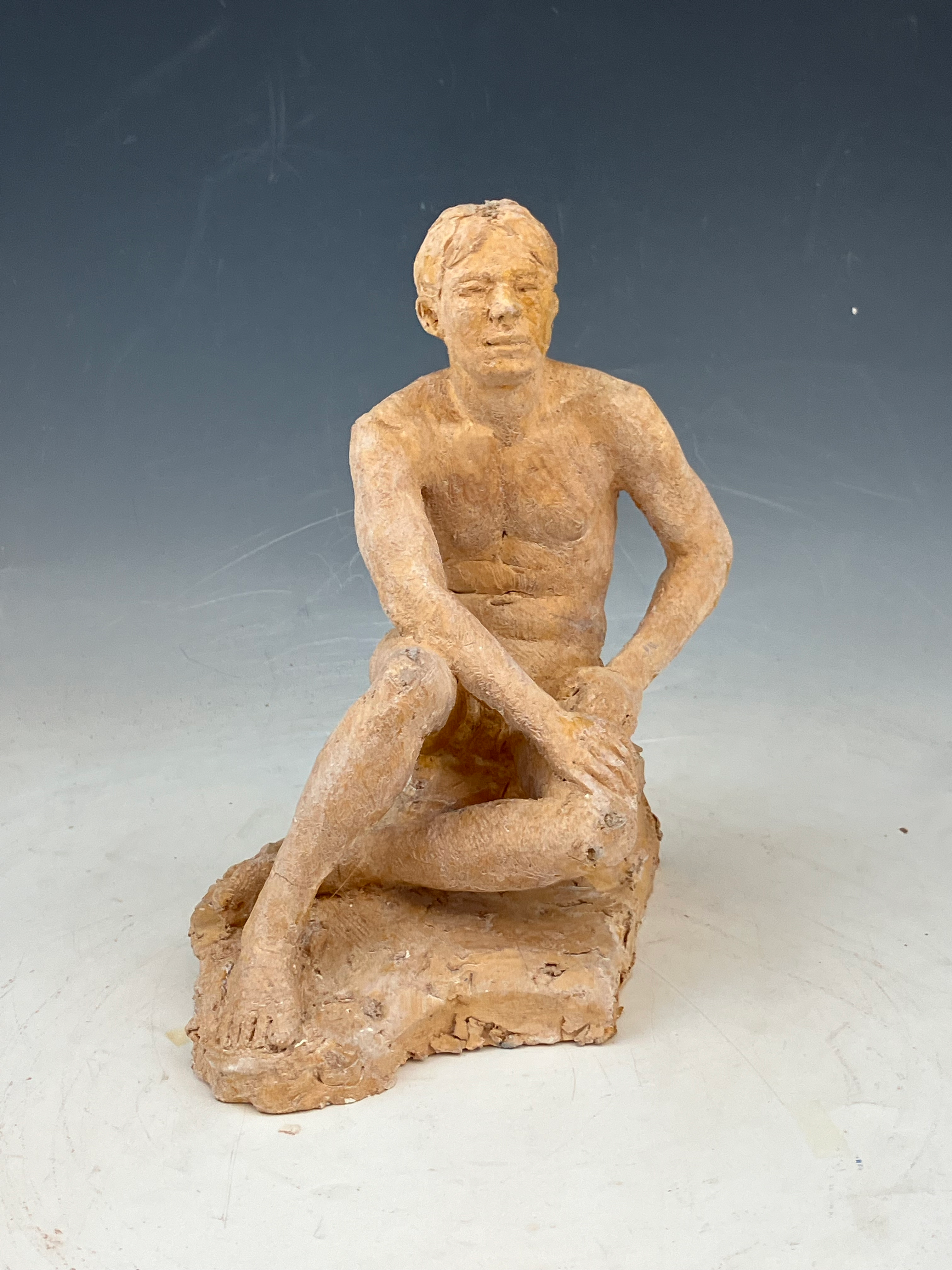 Seated male figure study