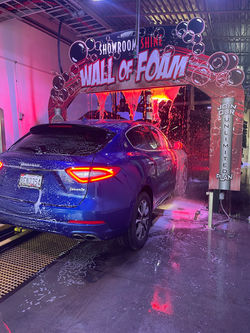 Clean Car going through the tunnel at Showroom Shine located in Gambrills, MD!!
