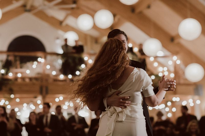 Bride and groom dancing first dance at wedding