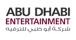 Projection screen, stage lights, audience, sound system, microphones, presenter, visual effects, AV equipment, live event, multimedia setup.