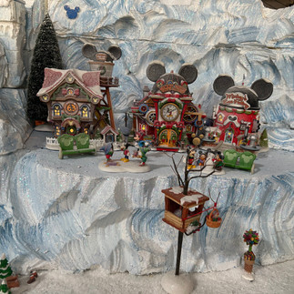 Mickey themed houses in the Christmas Village at Disney's Yacht Club Resort