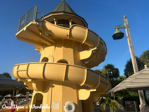 Pirate ship themed water slide at Disney’s Vero Beach Resort pool area surrounded by palm trees and family-friendly amenities