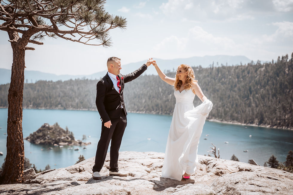 a wedding couple dancing on a rock at their Lake Tahoe Elopement Location