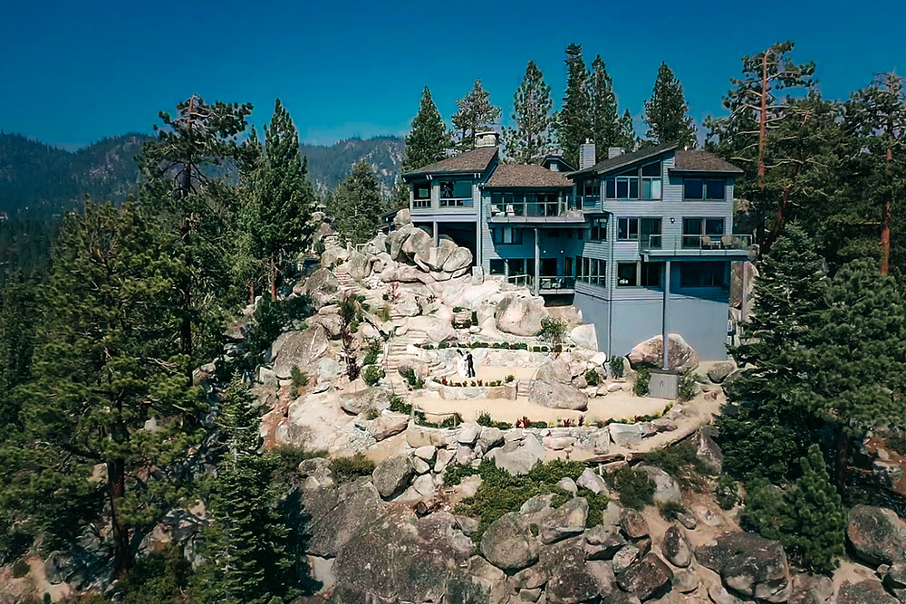 A sky drone shot of the Tahoe Blue Estate Wedding reception venue in Lake Tahoe
