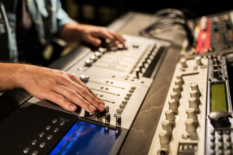 man-using-mixing-console-in-music-recording-P3SS343.jpg