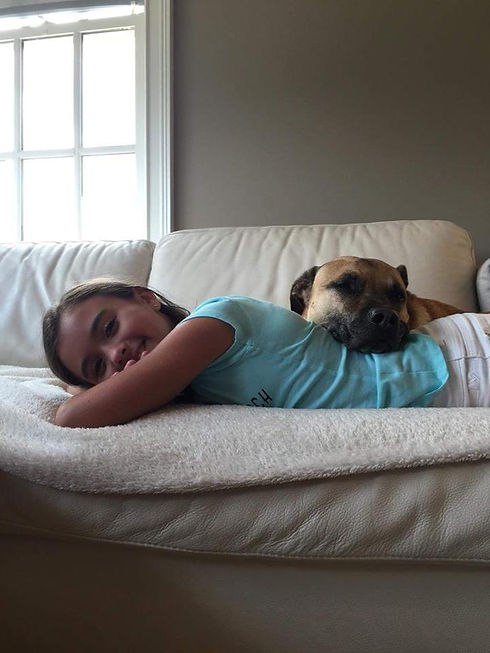 Emma and Buck laying on the couch.jpg