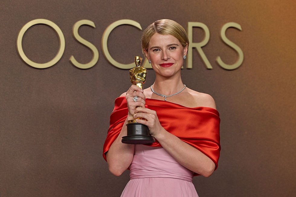 Jessie Buckley poses backstage with the Oscar® for Actress in a Leading Role during the 98th Oscars® at Dolby® Theatre at Ovation Hollywood | Oscar statuette ©A.M.P.A.S.®