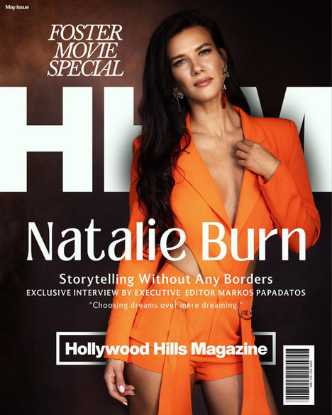 Magazine cover of Natalie Burn in a bright orange suit on a dark background, with FOSTER MOVIE SPECIAL and Hollywood Hills Magazine text - Cover by Avi Wiseman, Photography by Ian Fisher