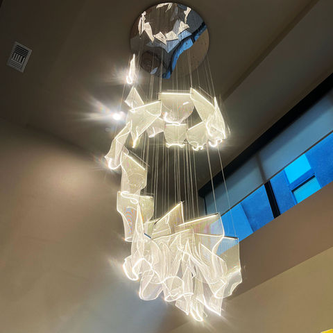 Modern multi-pendant custom chandelier specialty lighting fixture professionally installed on a high ceiling by All City Electric in Las Vegas.