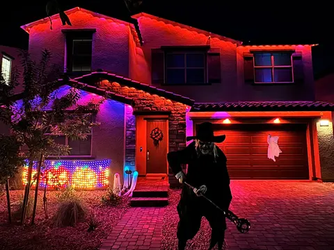Permanent Govee smart holiday lighting system custom installed on a residential home exterior for a Halloween display by All City Electric in Las Vegas.