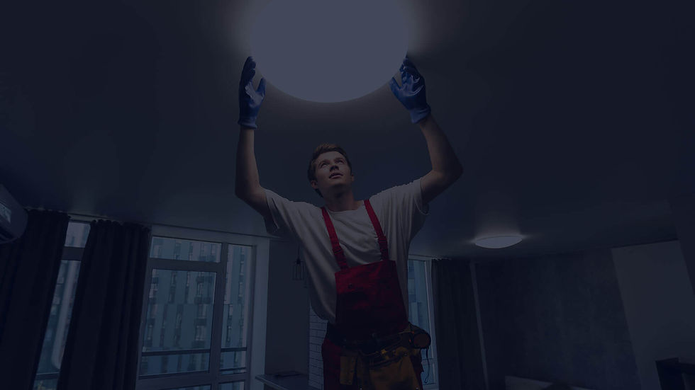 ELECTRICIAN INSTALLING LIGHT