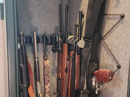 Florissant estate firearm appraisal of closet safe with Ruger .44 Magnum Carbine and rifles.