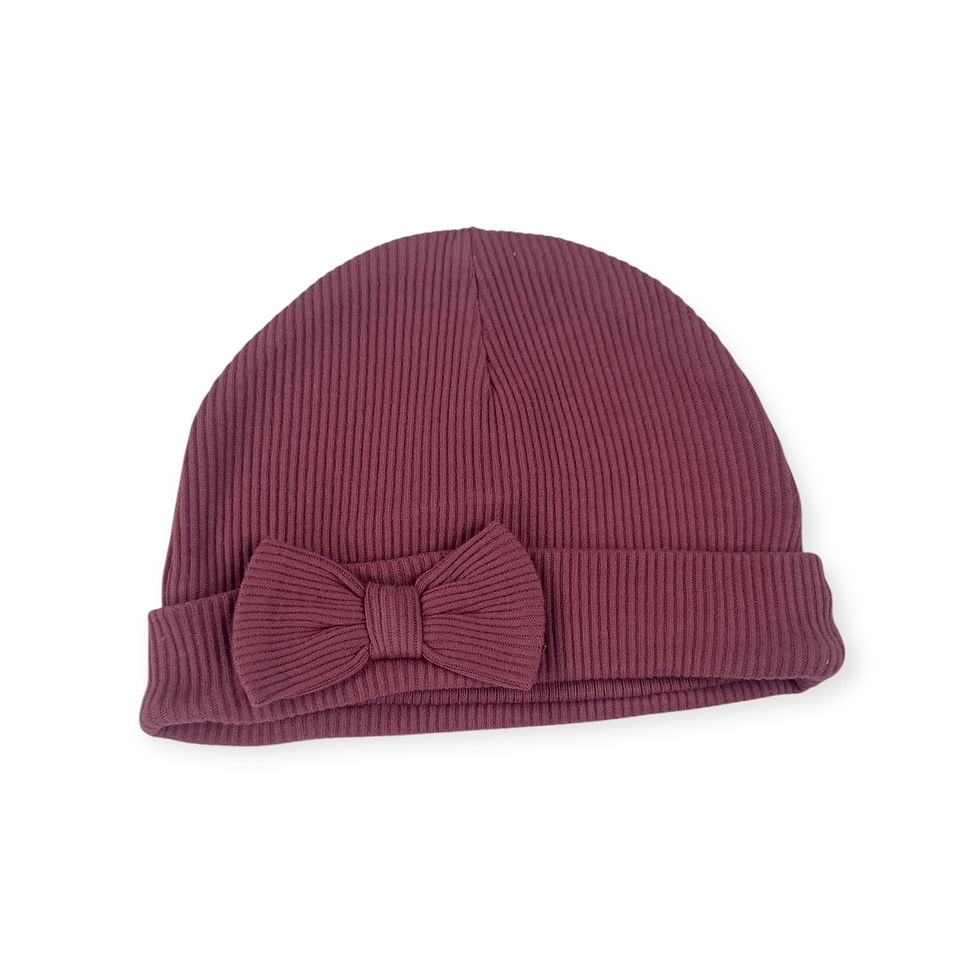Thumbnail: Rose coloured ribbed hat, with a small bow on.