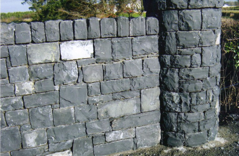 Stone wall with round pier