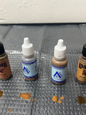 A selection of ink pigments used for permanent makeup training.