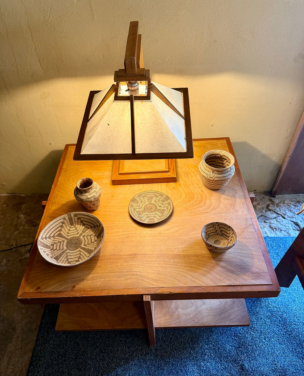 Frank Lloyd Wright-designed end table and lamp along with finely crafted Native American basketry