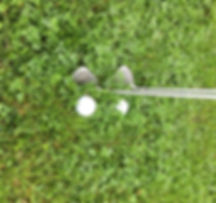 Choosing the correct club to hit a golf ball out of the rough