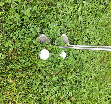 Choosing the correct club to hit a golf ball out of the rough