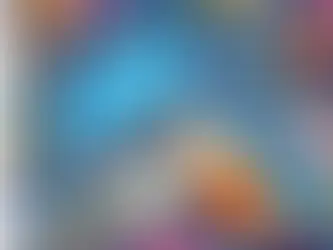 Laptop on a colorful desk with pens, coffee, gadgets. Hand points at screen displaying gears. Bright tech-themed design.