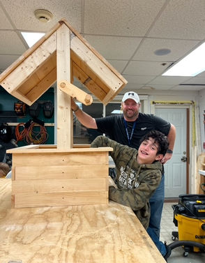 Chris building with the kids of Austin 17 House