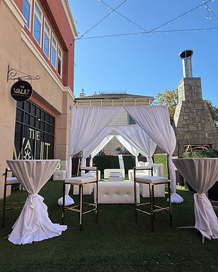 cabana drapery with lounge & cocktail table setup