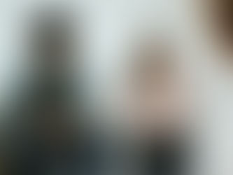 A couple talking with a therapist during a couples counseling session