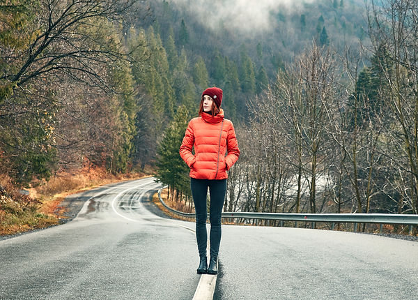 Girl Walking in Empty Road