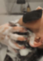 Client receiving Japanese Head Spa with rich foam massage at Not Just Hair Burlington.