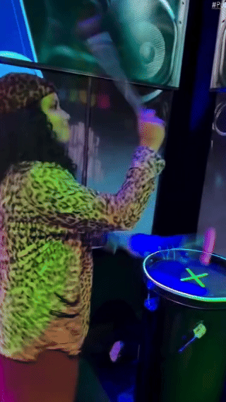 Ativação Beat Hero da Philco no Rock in Rio 2026 com timbaus iluminados e sensores, desenvolvida pela Phygital Solutions junto à Agência Atenas.